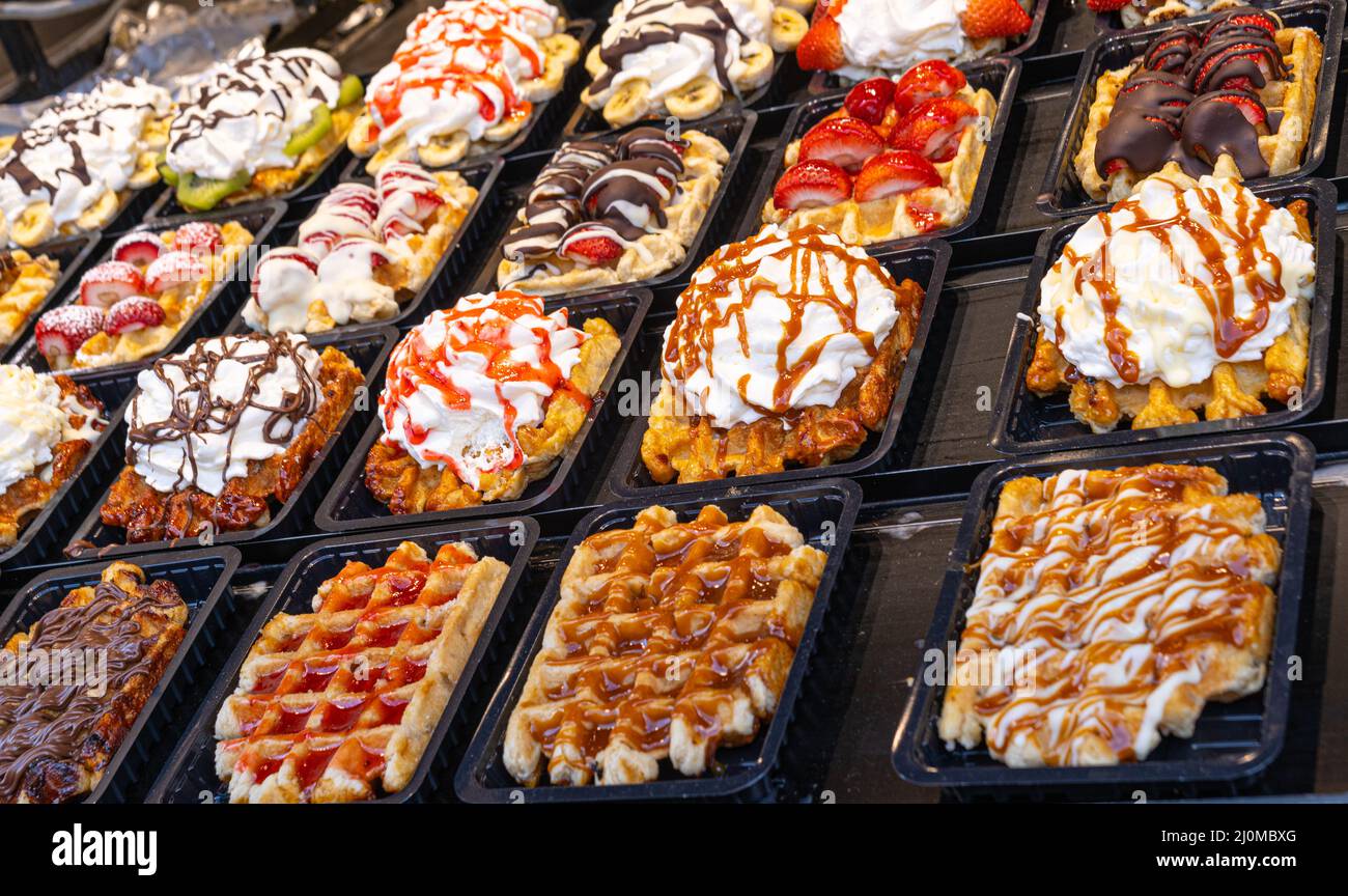 Belgian waffles with colorful toppings on showcase. Brussels Stock Photo Alamy