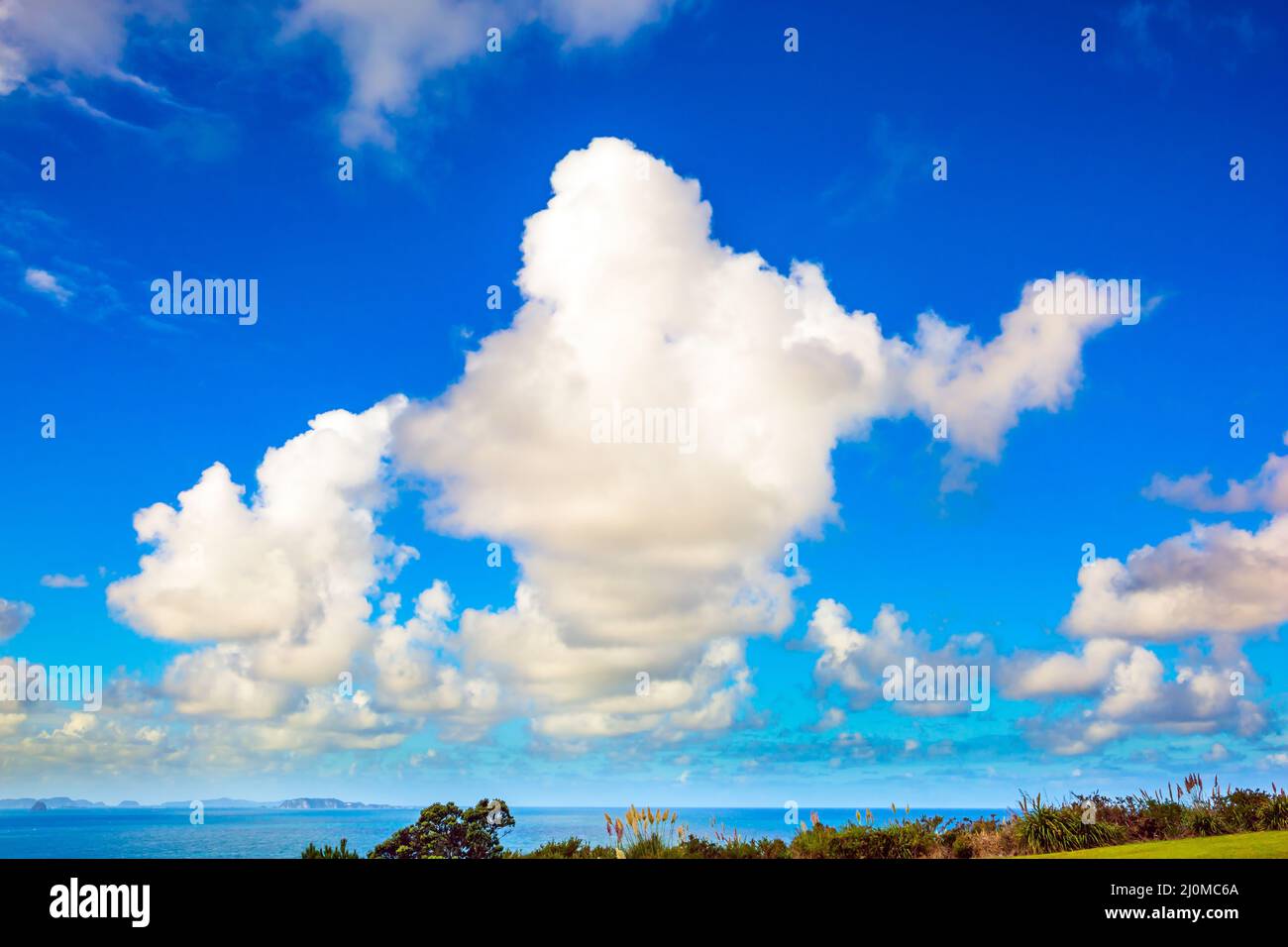 Incredible clouds over road to the cove Stock Photo