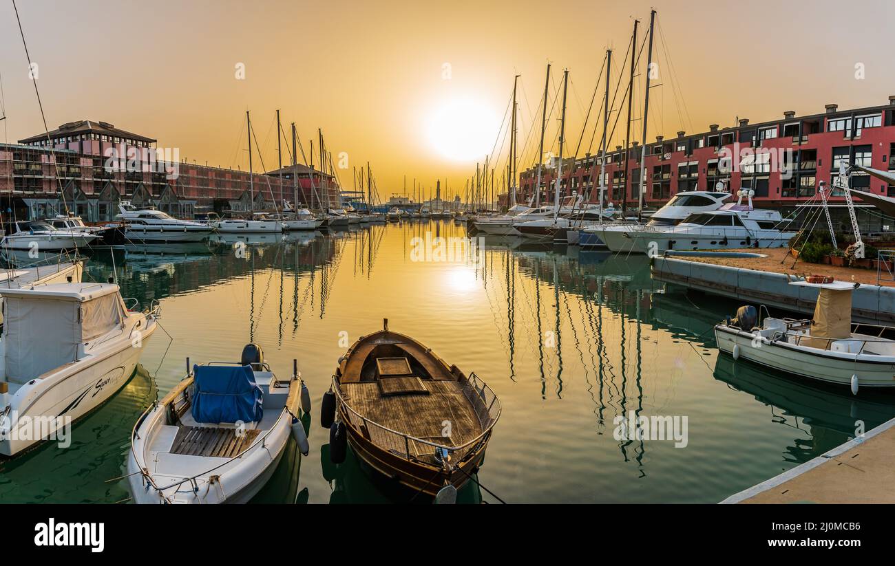 Touristic port of Genoa at sunset Stock Photo