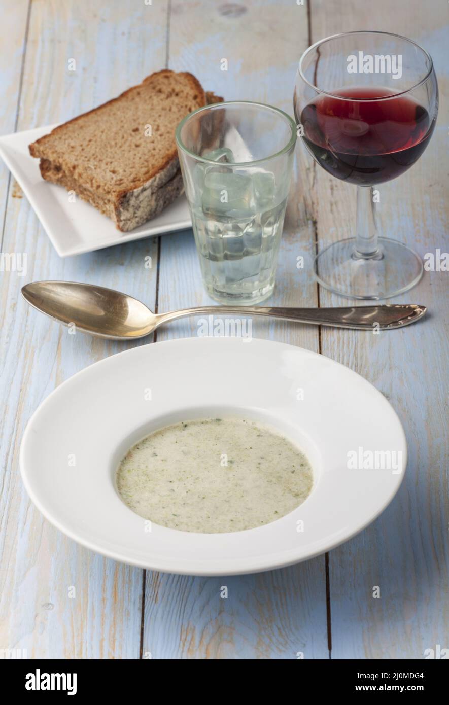 Chervil soup with red wine Stock Photo