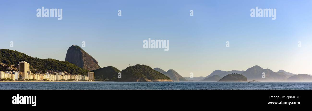Panoramic image of Copacabana beach with the Sugar Loaf Mountain Stock Photo