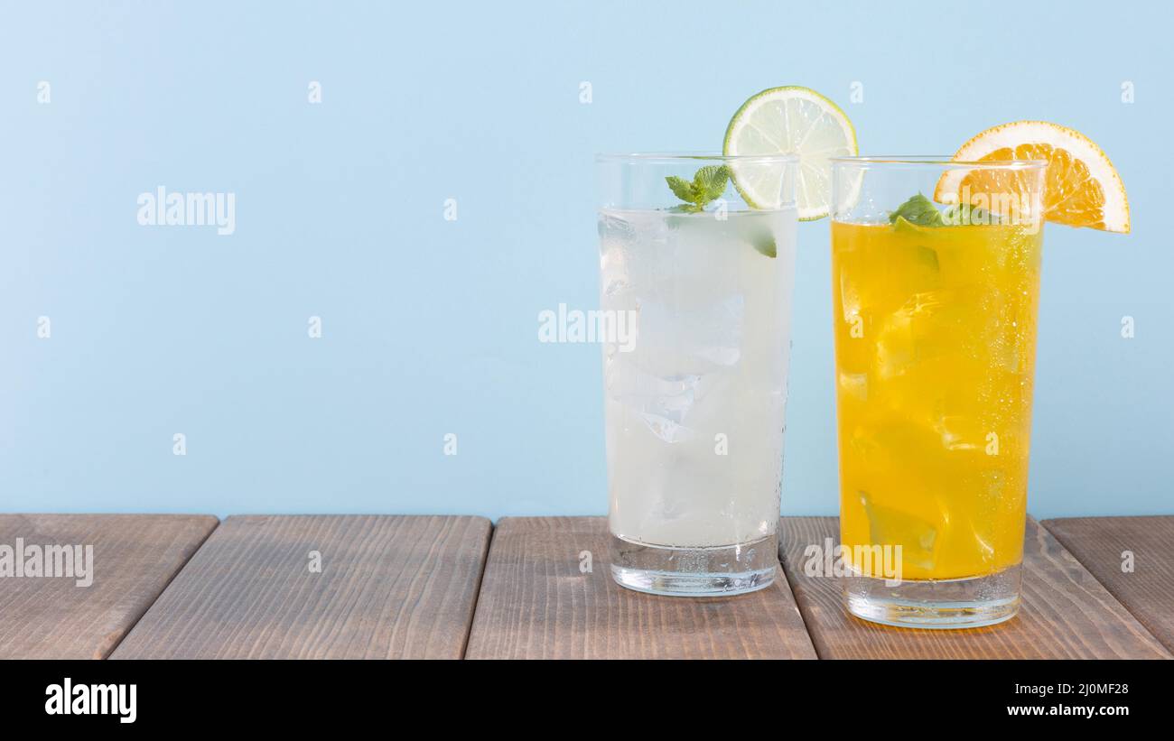 Glass with orange lemonade drink Stock Photo