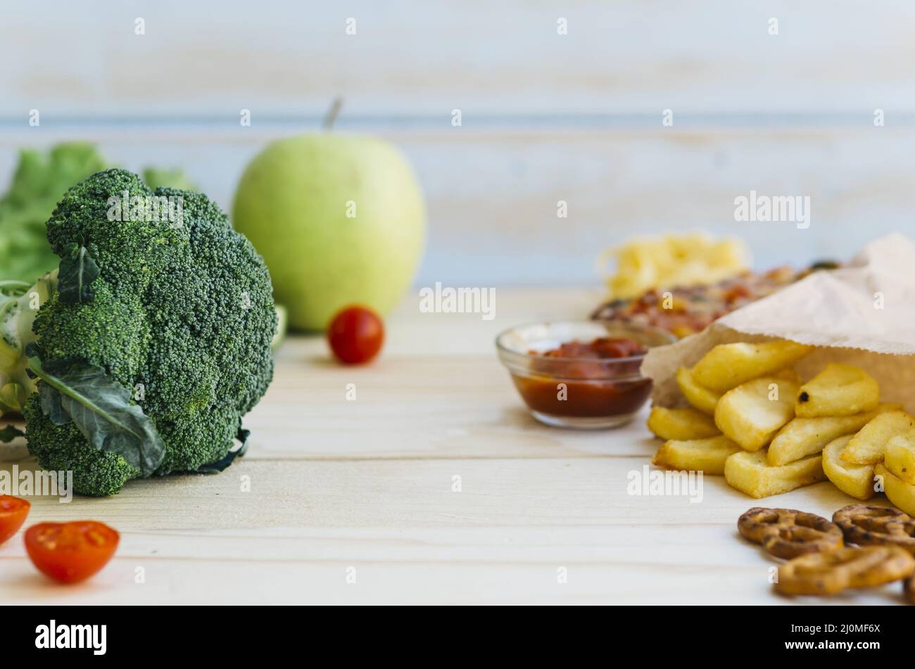 Healthy Food Vs Unhealthy Food Stock Photo - Alamy