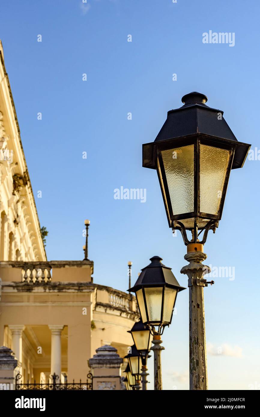 Old street lighting lanterns during the late afternoon in the Pelourinho district Stock Photo