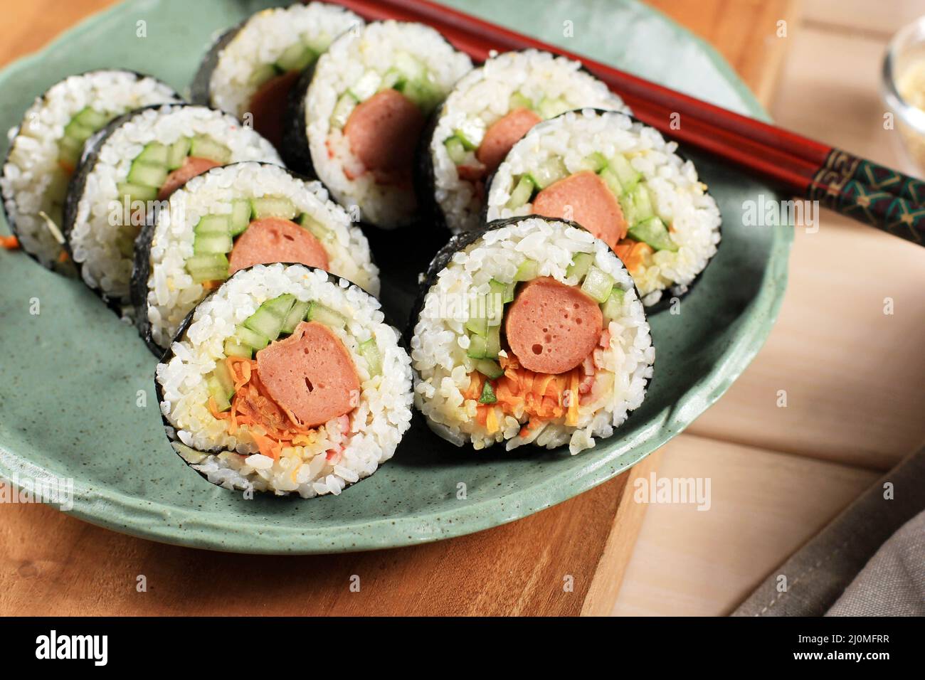 Korean Roll Gimbap or Kimbob Made from Steamed White Rice (Bap) and Various Other Ingredients, Close Up Stock Photo