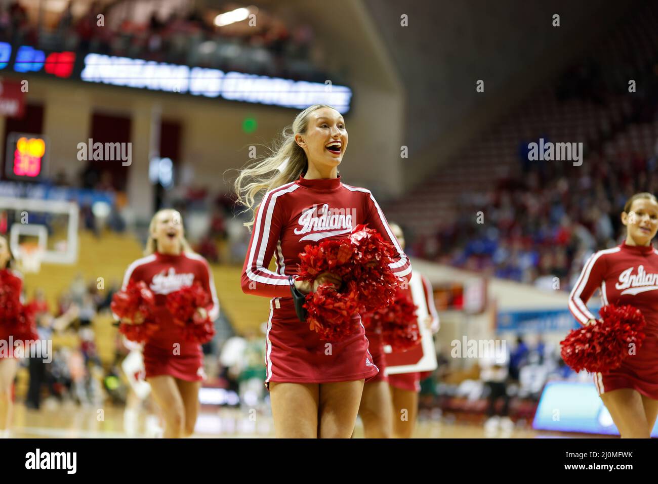 Bloomington, United States. 19th Mar, 2022. Indiana University cheerleaders cheer for the Hoosiers against Charlotte during round 1 of the 2022 NCAA Division 1 Women's Basketball Championship, at Simon Skjodt Assembly Hall in Bloomington. Indiana University beat Charlotte 85-51. Credit: SOPA Images Limited/Alamy Live News Stock Photo