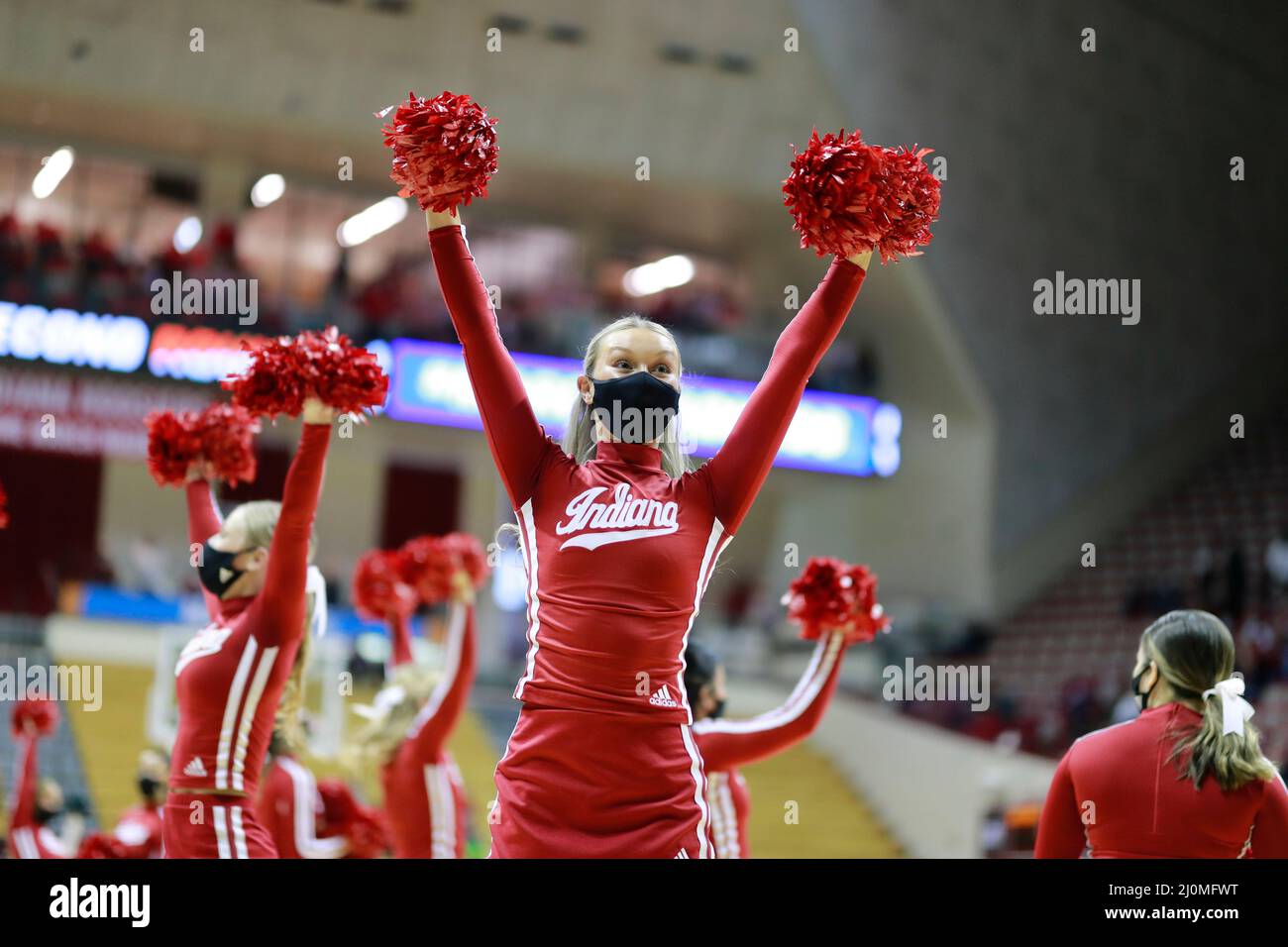 Bloomington, United States. 19th Mar, 2022. Indiana University cheerleaders cheer for the Hoosiers against Charlotte during round 1 of the 2022 NCAA Division 1 Women's Basketball Championship, at Simon Skjodt Assembly Hall in Bloomington. Indiana University beat Charlotte 85-51. Credit: SOPA Images Limited/Alamy Live News Stock Photo