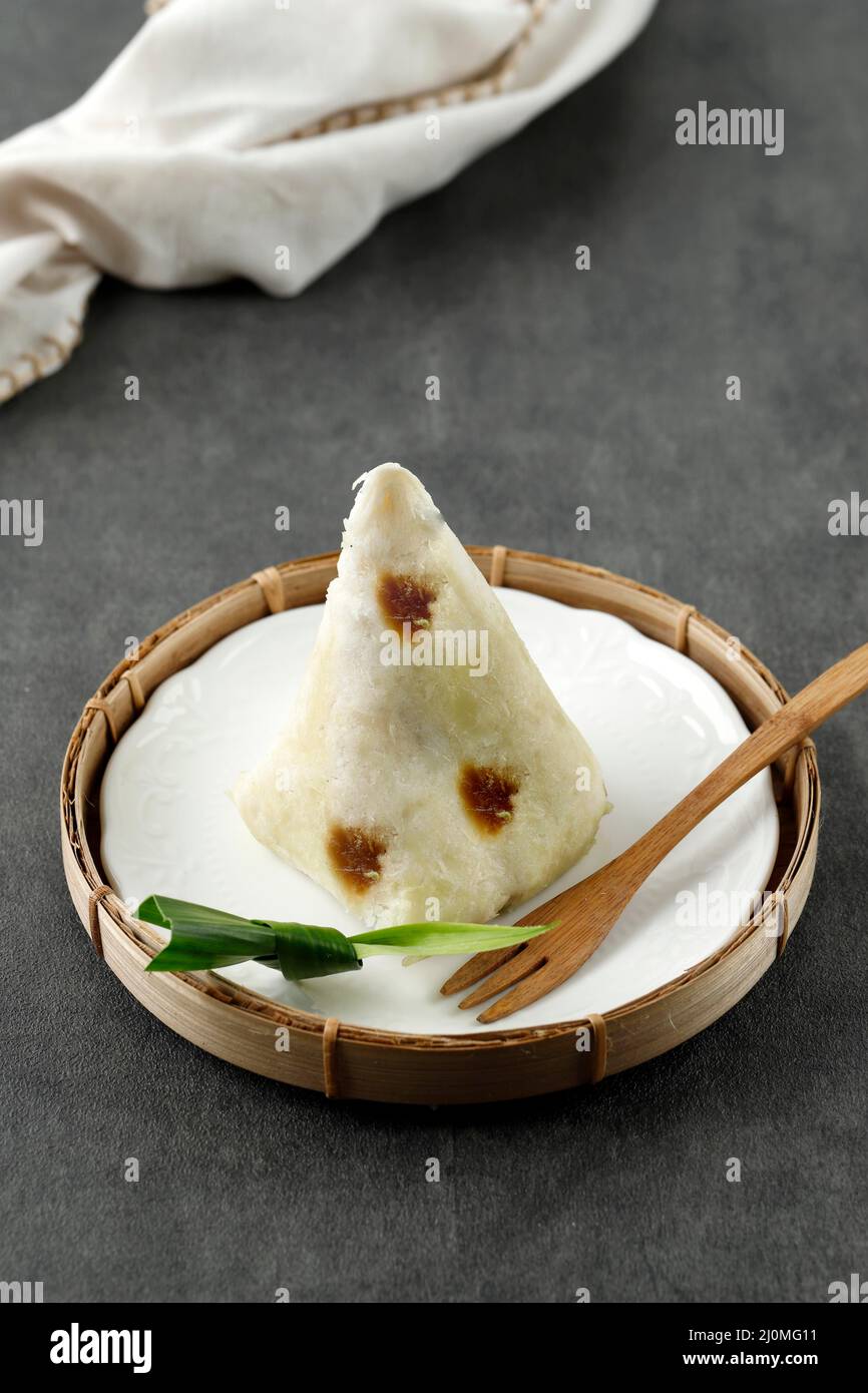 Awug Beras, Steamed Rice Flour, Shredded Coconut, and Palm Sugar, Popular Street Food from Bandung, West Java, Indonesia. Served on Bamboo Plate Stock Photo