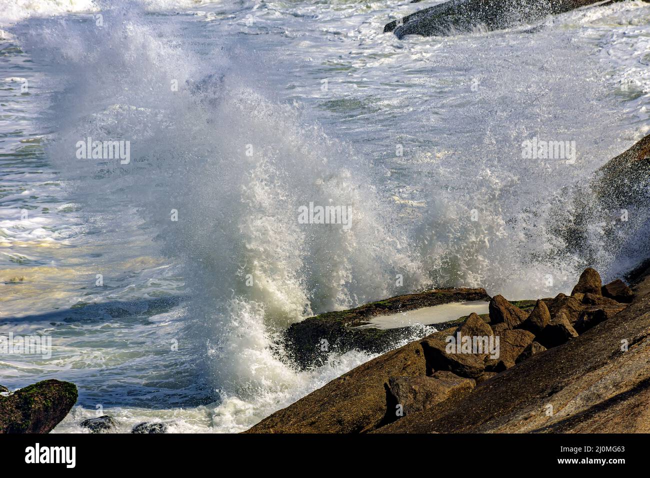 Sea water splashing into the air Stock Photo