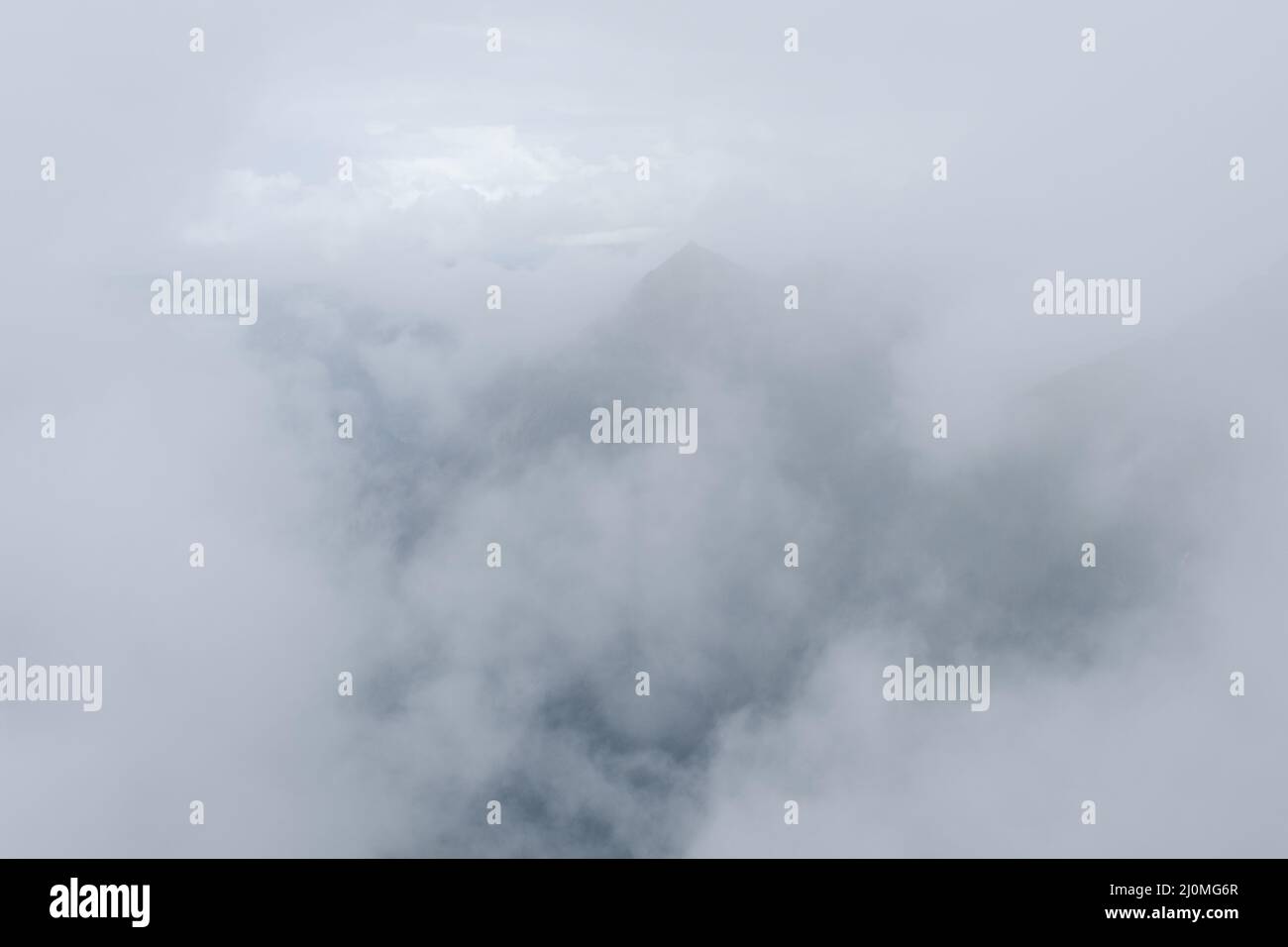 Mountain with fog, Kleinwalser Valley, Vorarlberg, Austria, Europe Stock Photo