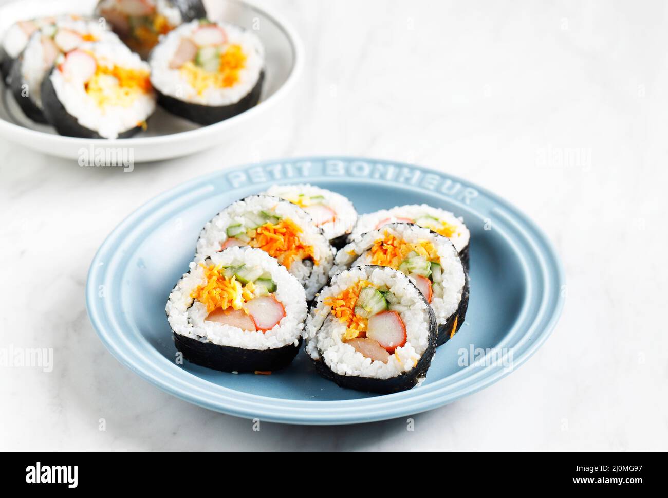 Korean Roll Gimbap (Kimbob or Kimbap) made from Steamed White Rice (Bap) and Various other Ingredients, Such As Kyuri, Carrot, Sausage, Crab Stick, or Stock Photo