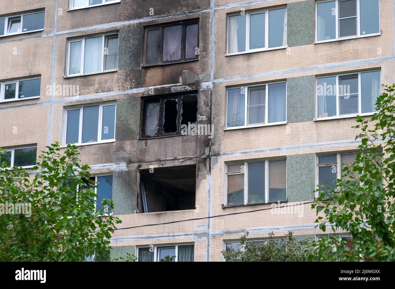 Windows of an apartment building after a fire Stock Photo - Alamy