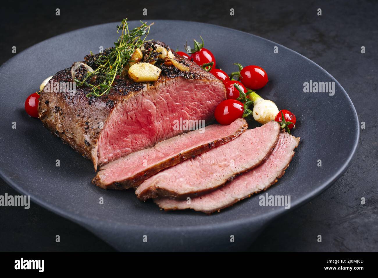 Modern style traditional Commonwealth Sunday roast with sliced cold