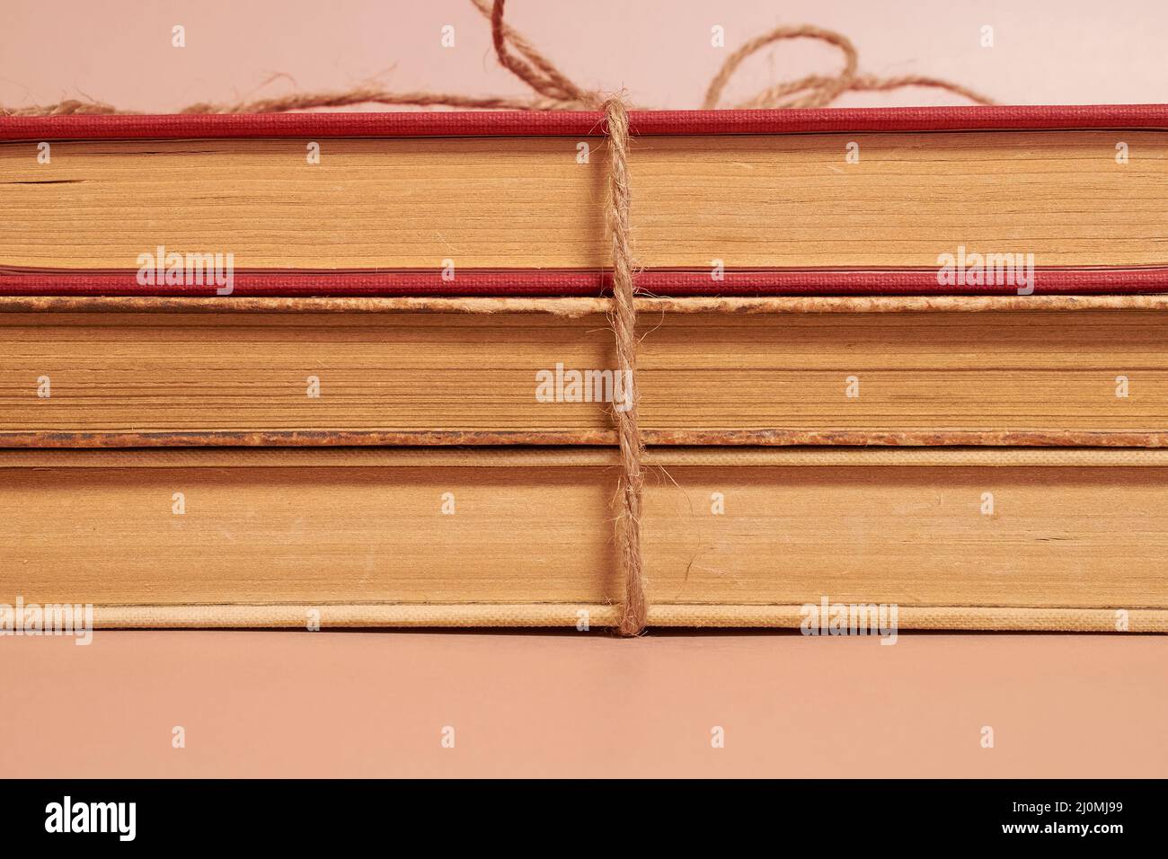 Books tied with a rope hi-res stock photography and images - Alamy