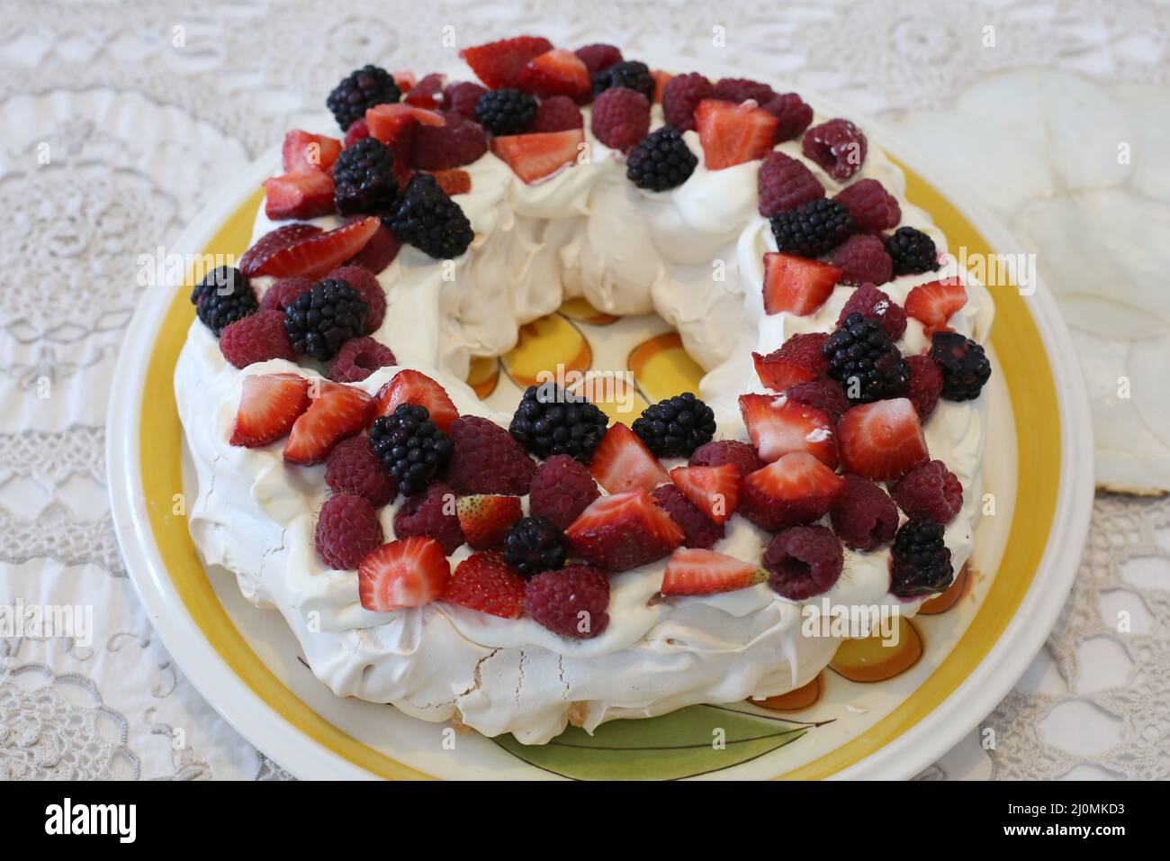 A home made traditional Australian Pavlova dessert with fresh whipped