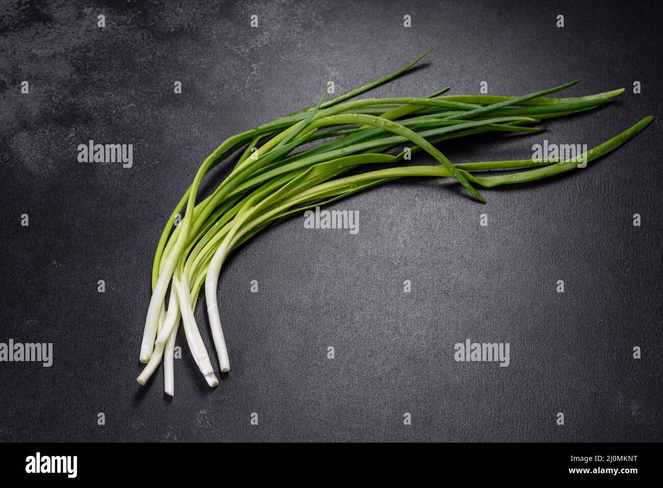 Green onion on a wooden board, fresh green onion Stock Photo - Alamy