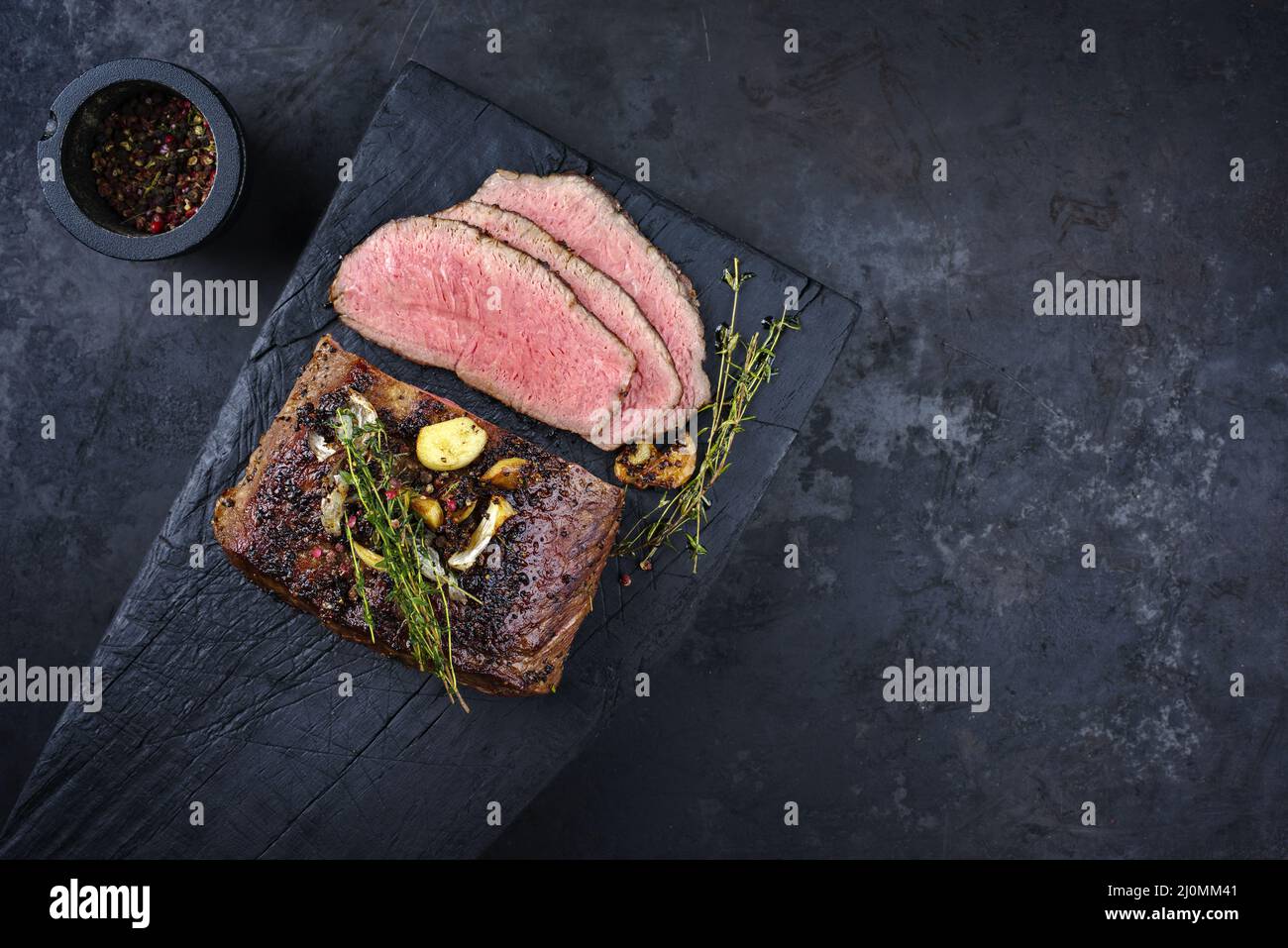 Traditional Commonwealth Sunday roast with sliced cold cuts roast beef ...