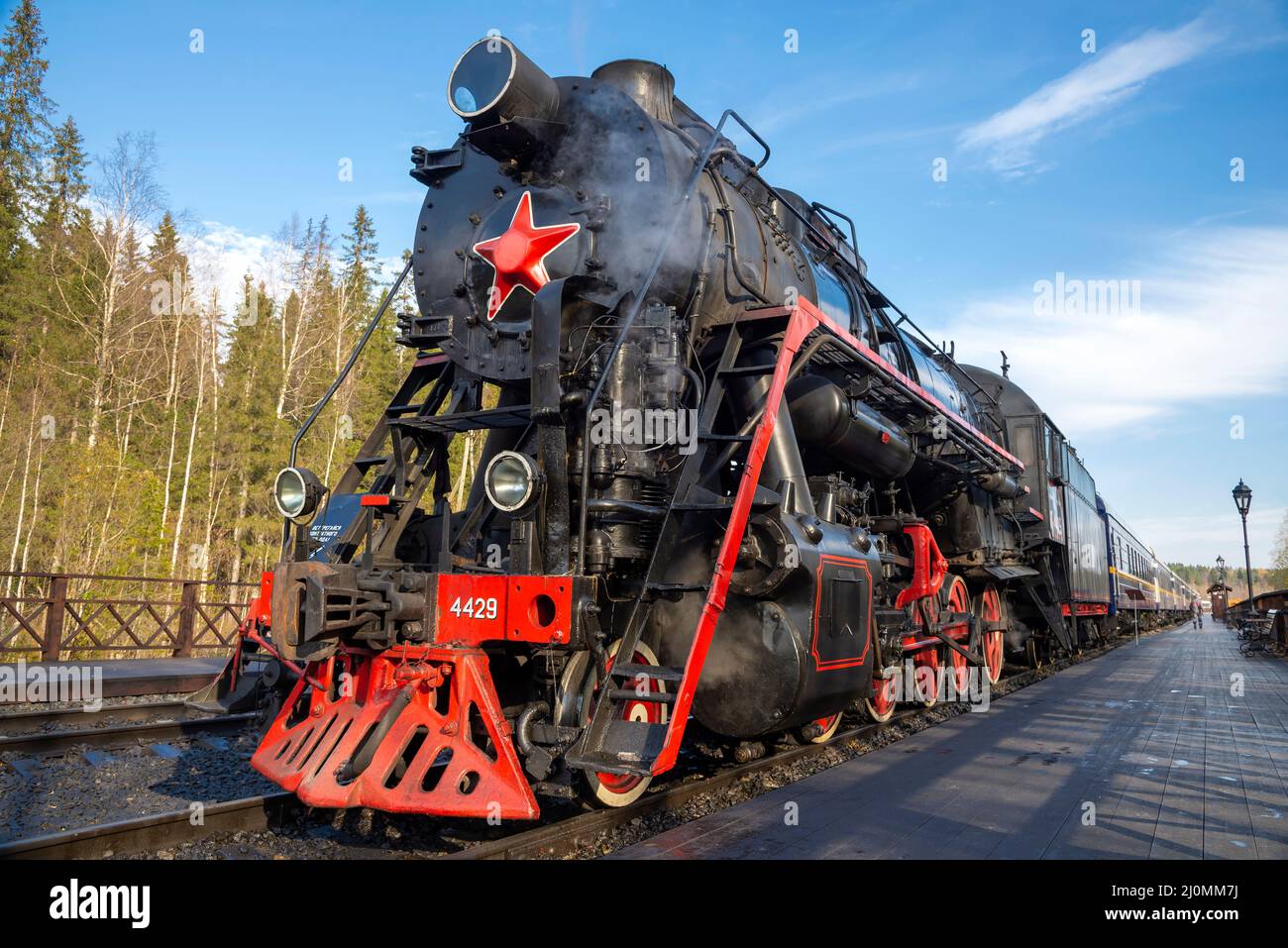 RUSKEALA, RUSSIA - OCTOBER 07, 2021: Tourist retro train 'Ruskeala Express' at the station 'Mountain Park Ruskeala' Stock Photo