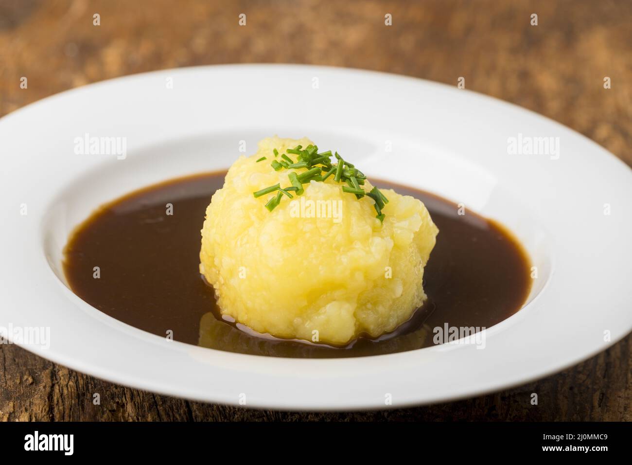 Dumpling with gravy Stock Photo Alamy