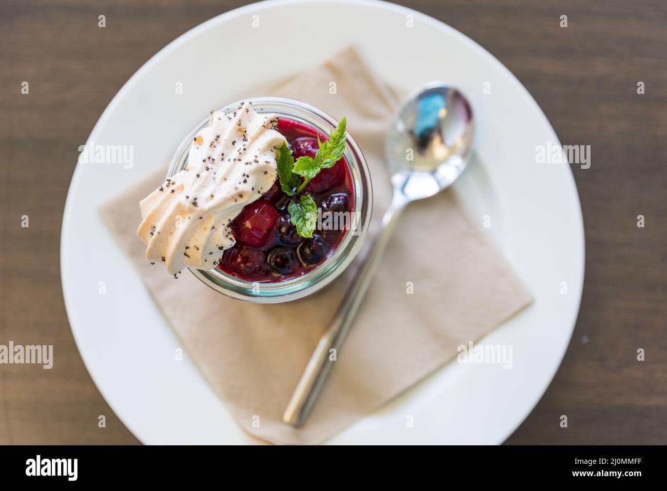 Delicious dessert Bavarian cream with berry roast Stock Photo