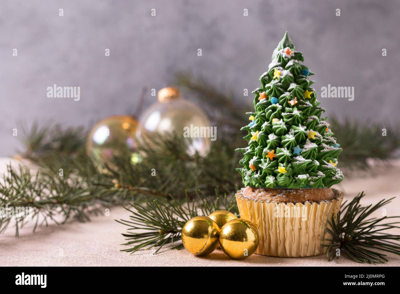 Front view cupcake with christmas tree frosting Stock Photo
