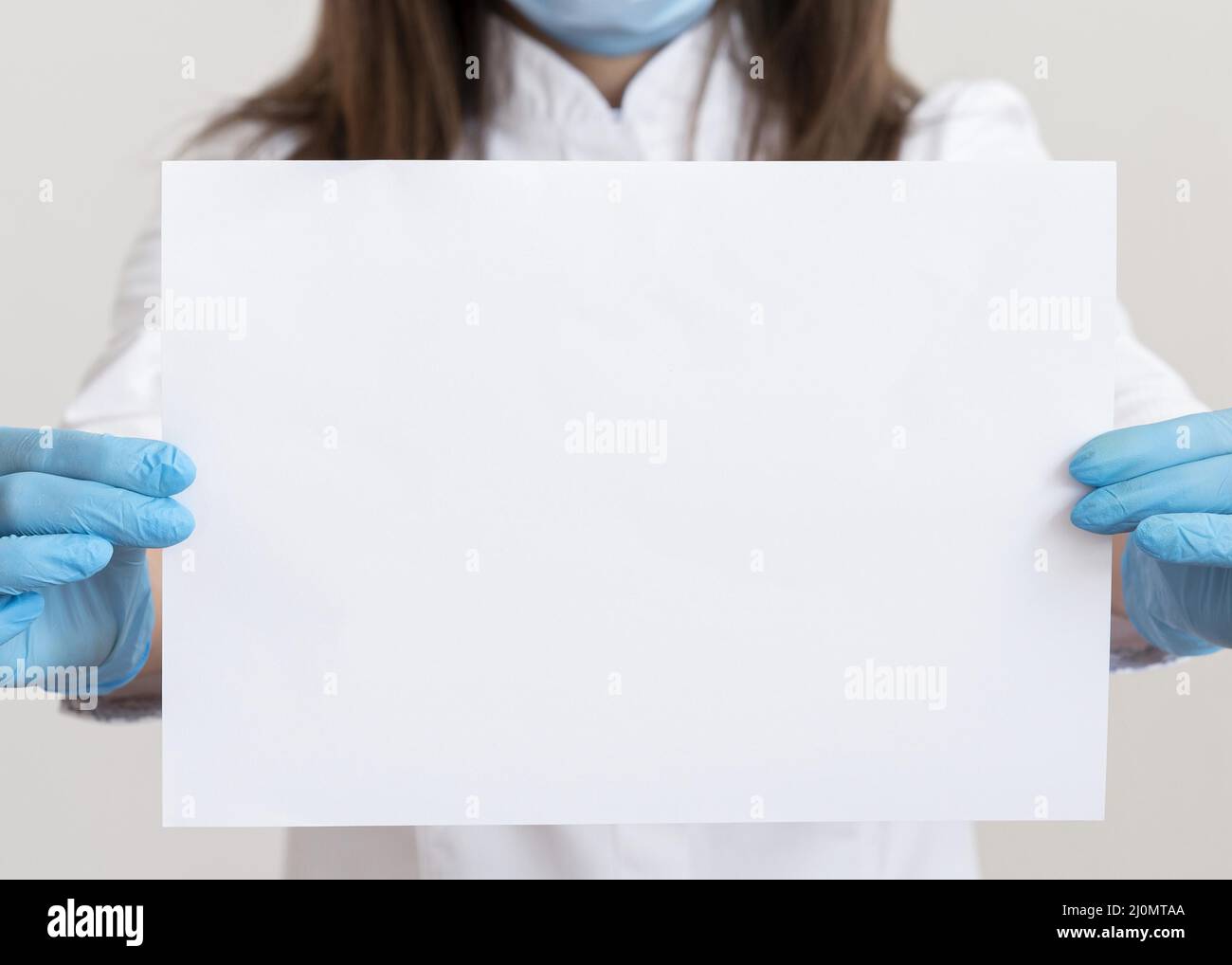 Doctor wearing face mask Stock Photo - Alamy