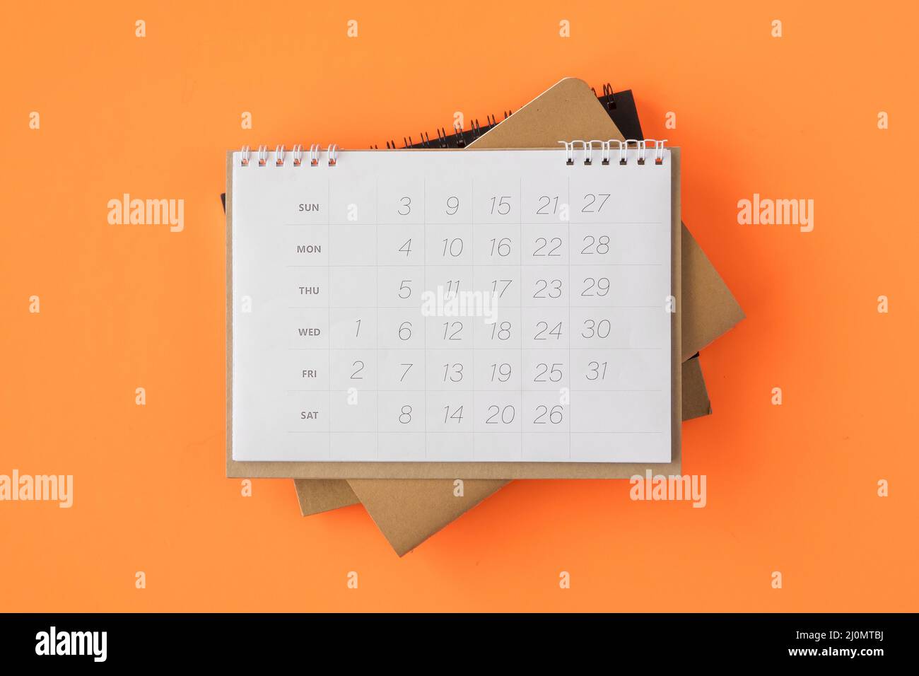 Flat lay pile planner calendars Stock Photo