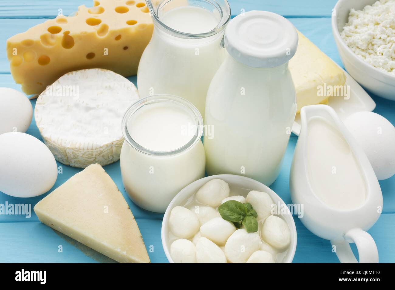 Close up organic milk with gourmet cheese Stock Photo