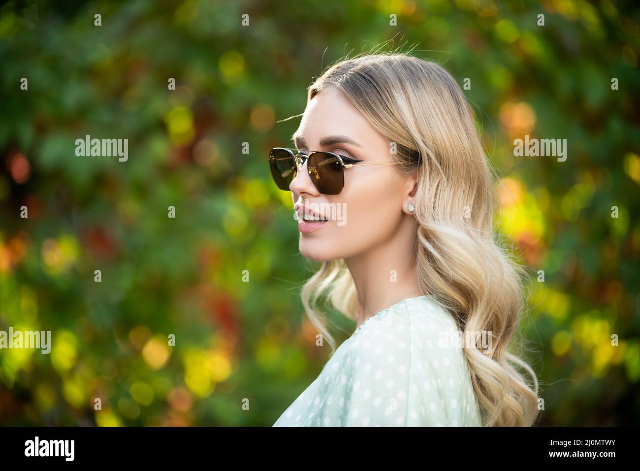Portrait of a young woman in sunglasses, close up face of beautiful ...