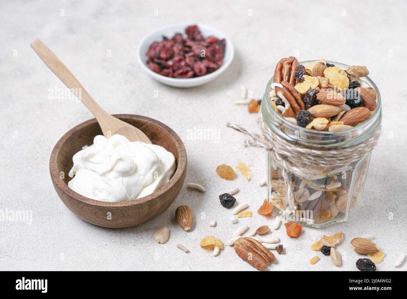 Close up breakfast with yogurt nuts Stock Photo - Alamy