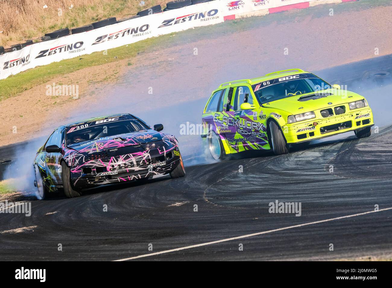Middlesbrough, UK. 20th Mar, 2022. Billy Burrray BMW Chases down Egis Manelga Nissan 300ZX Teeside Autodrome, Middlesbrough, United Kingdom on 20 March 2022 during Round 1 of the 2022 British Drift Championship, Craig McAllister Credit: Every Second Media/Alamy Live News Stock Photo