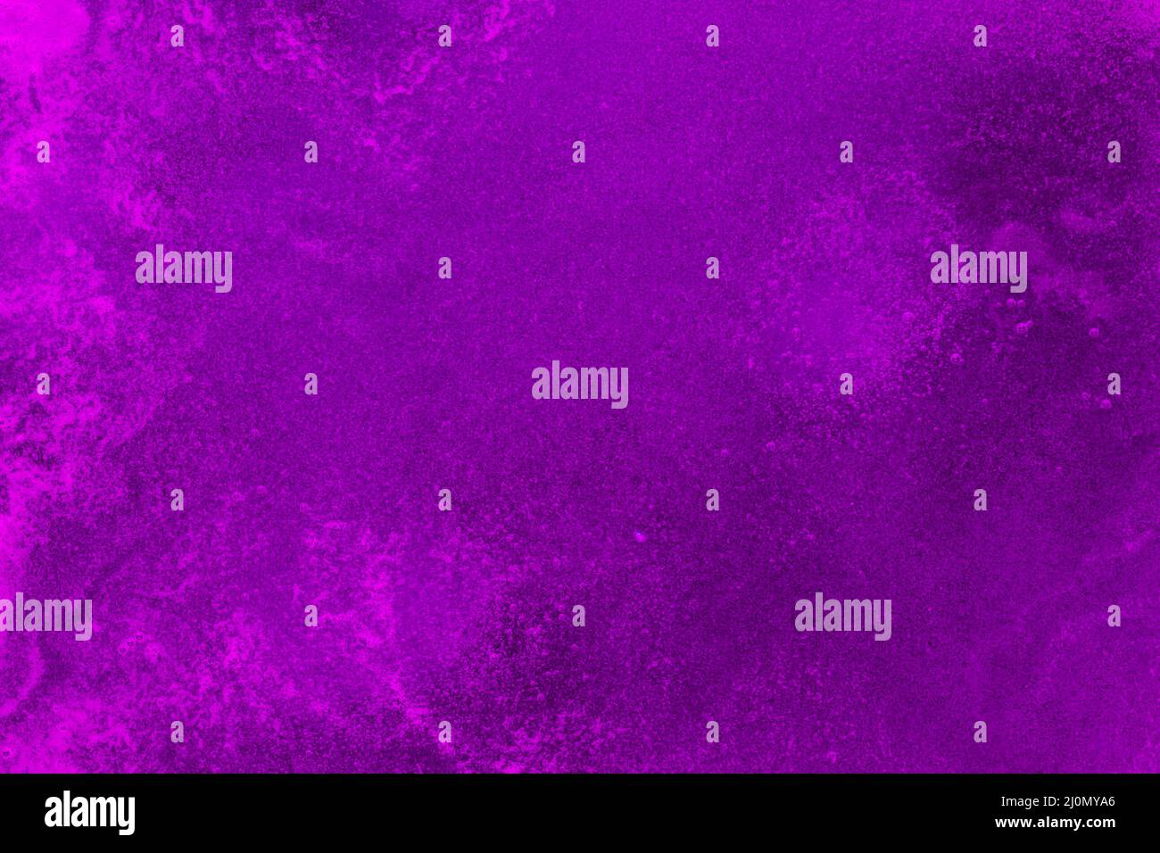 Foamy texture purple colored liquid Stock Photo