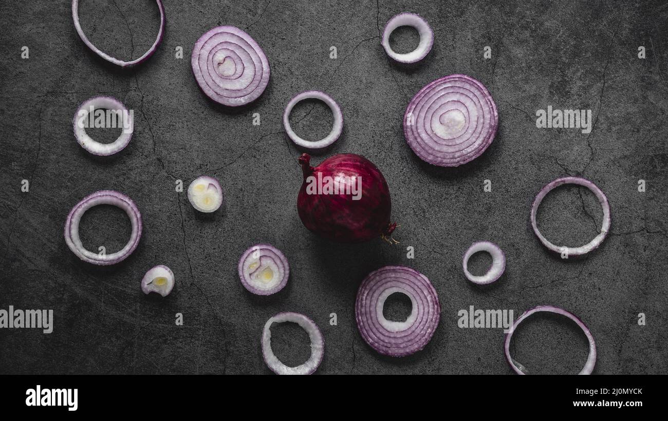 Flat lay arrangement red onion rings Stock Photo