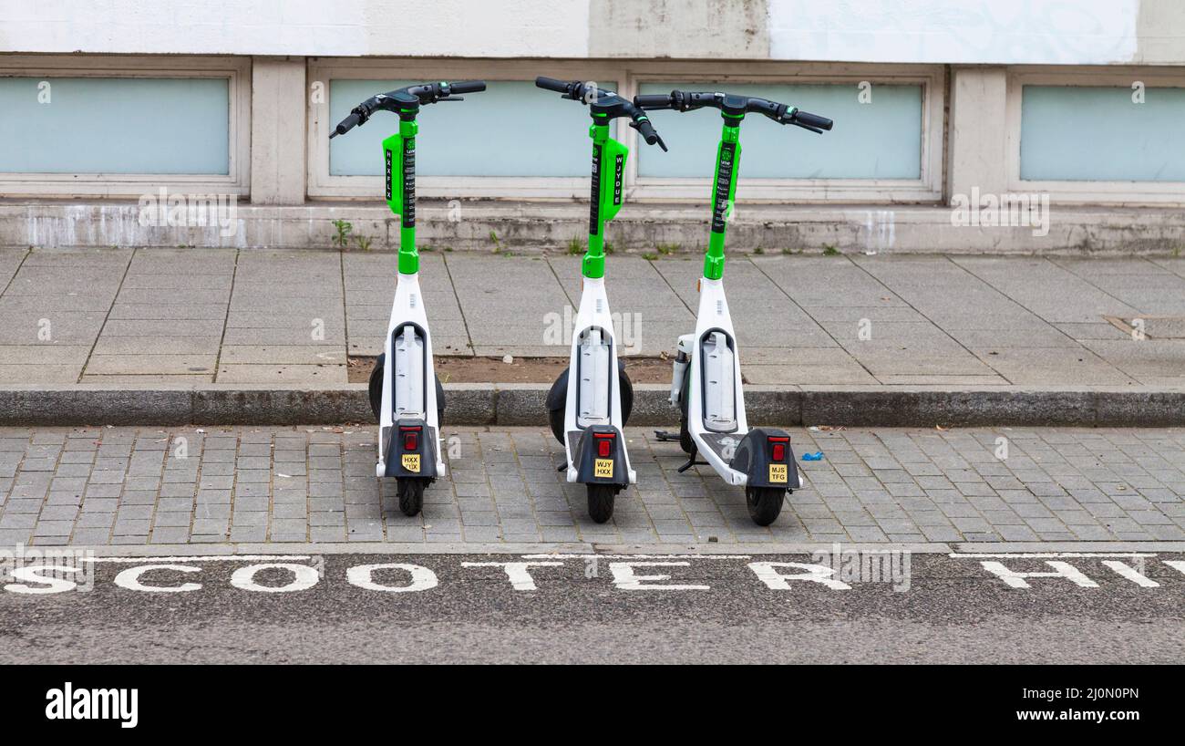 E scooters in a parking bay in London,England,UK Stock Photo