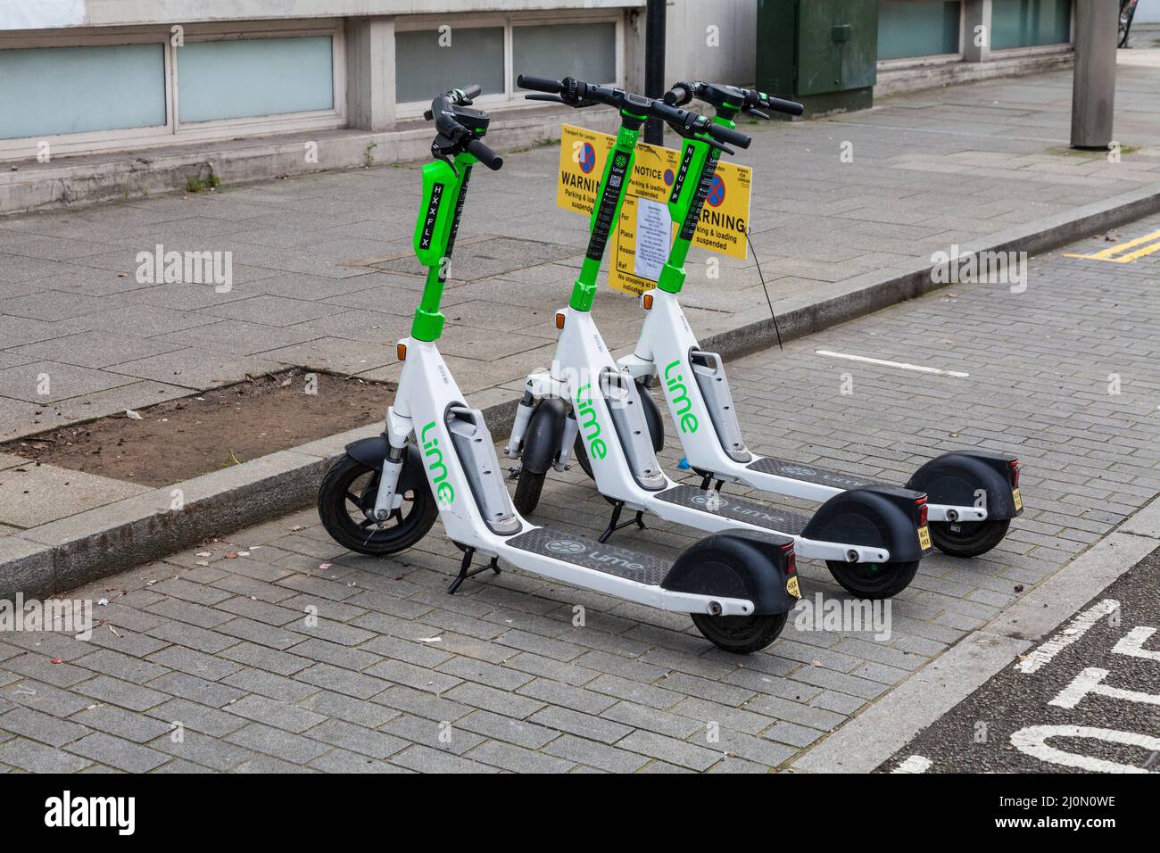 Lime E scooters in a parking bay in London,England,UK Stock Photo Alamy