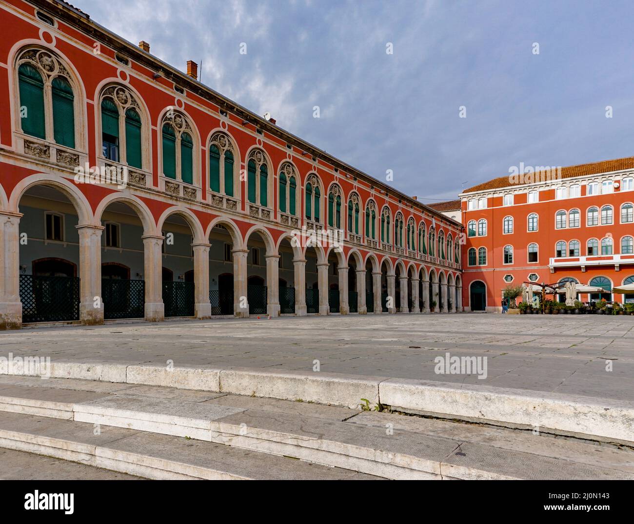 View of the Republic Square and its neo-Renaissance buildings on three sides in the historic city center of Split Stock Photo