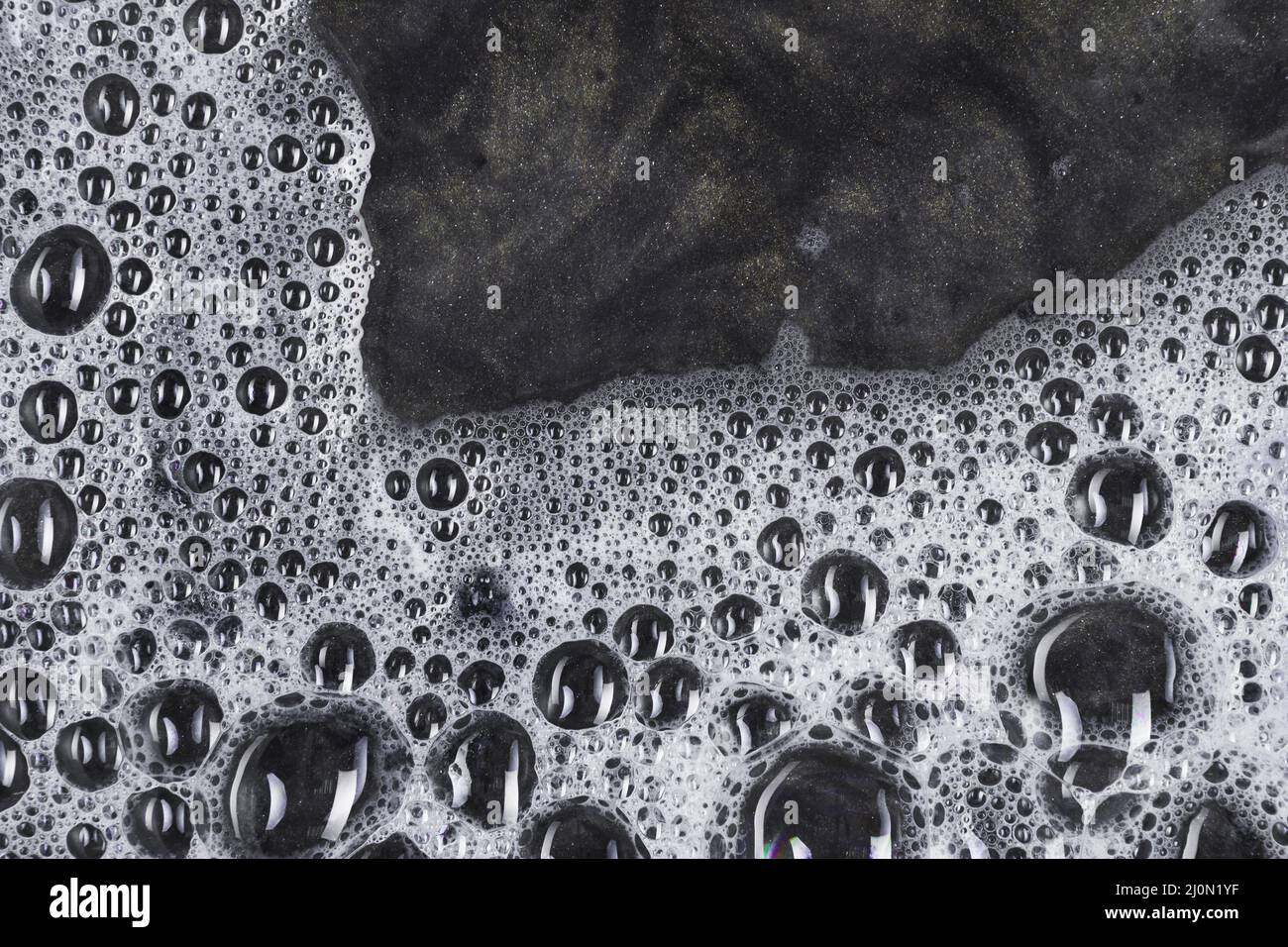 Bubbles dark water Stock Photo