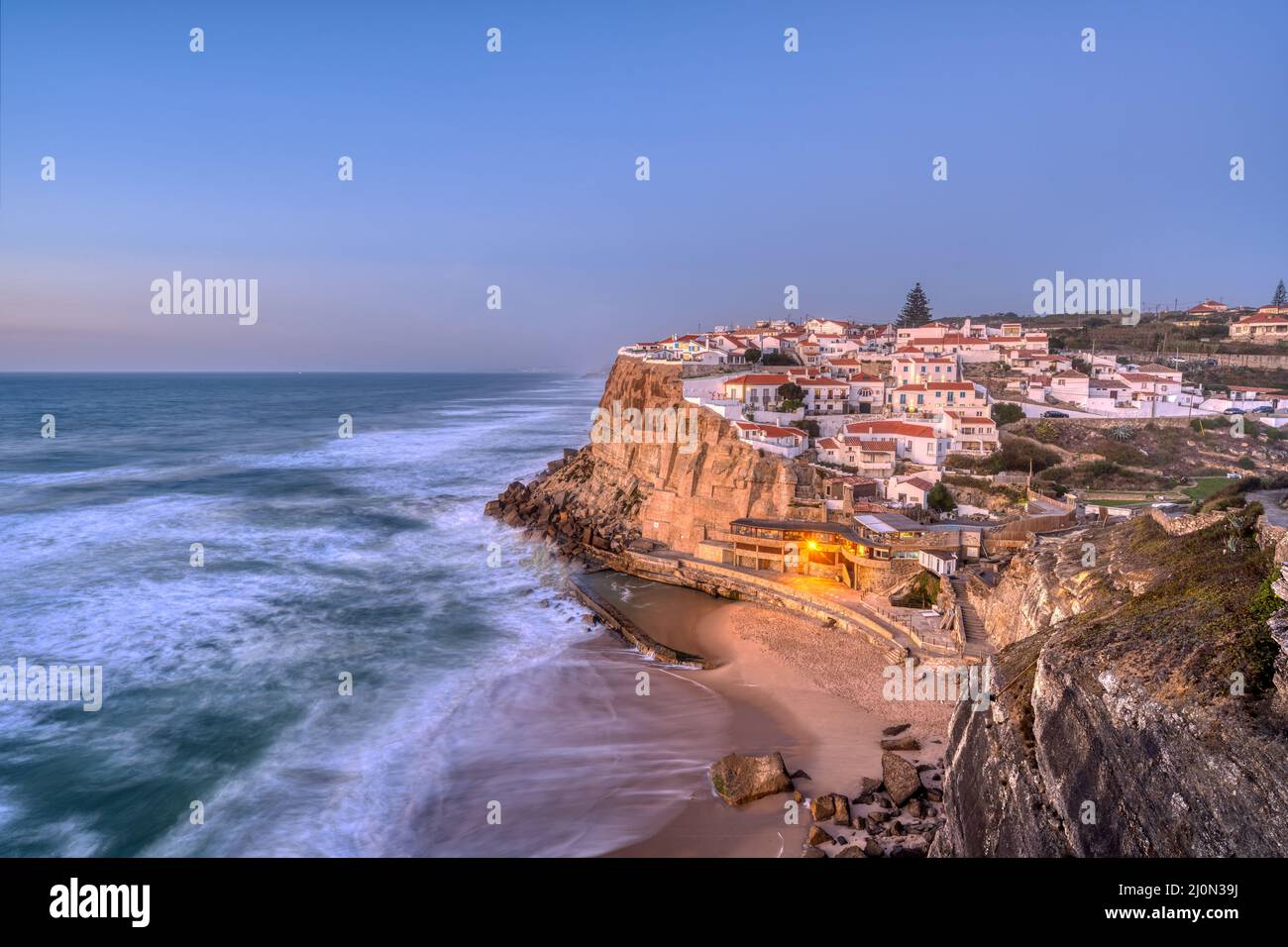 Azenhas do Mar at the portuguese Atlantic coast just after sunset Stock Photo