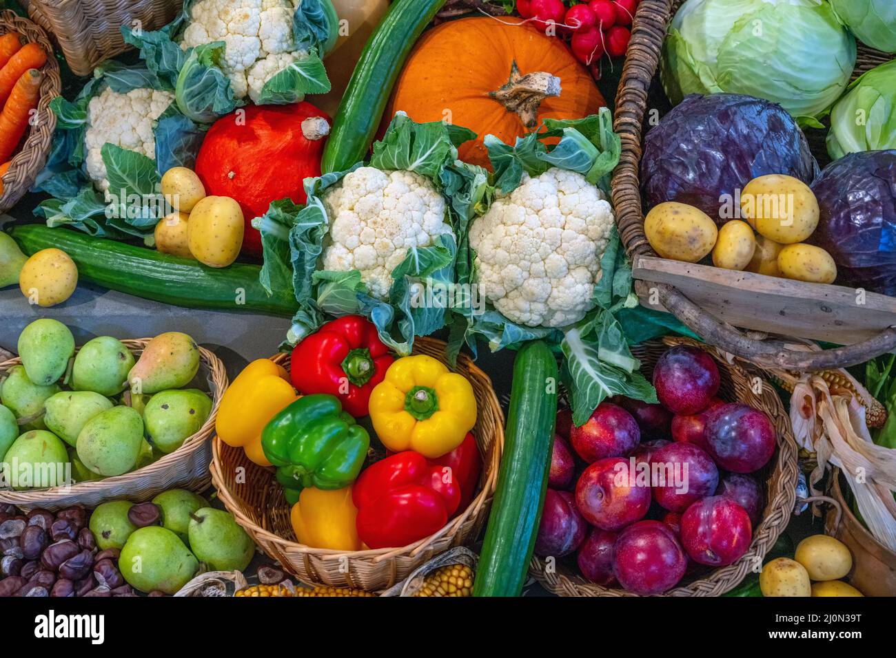 Different kinds of vegetables and fruits for sale on a market Stock Photo