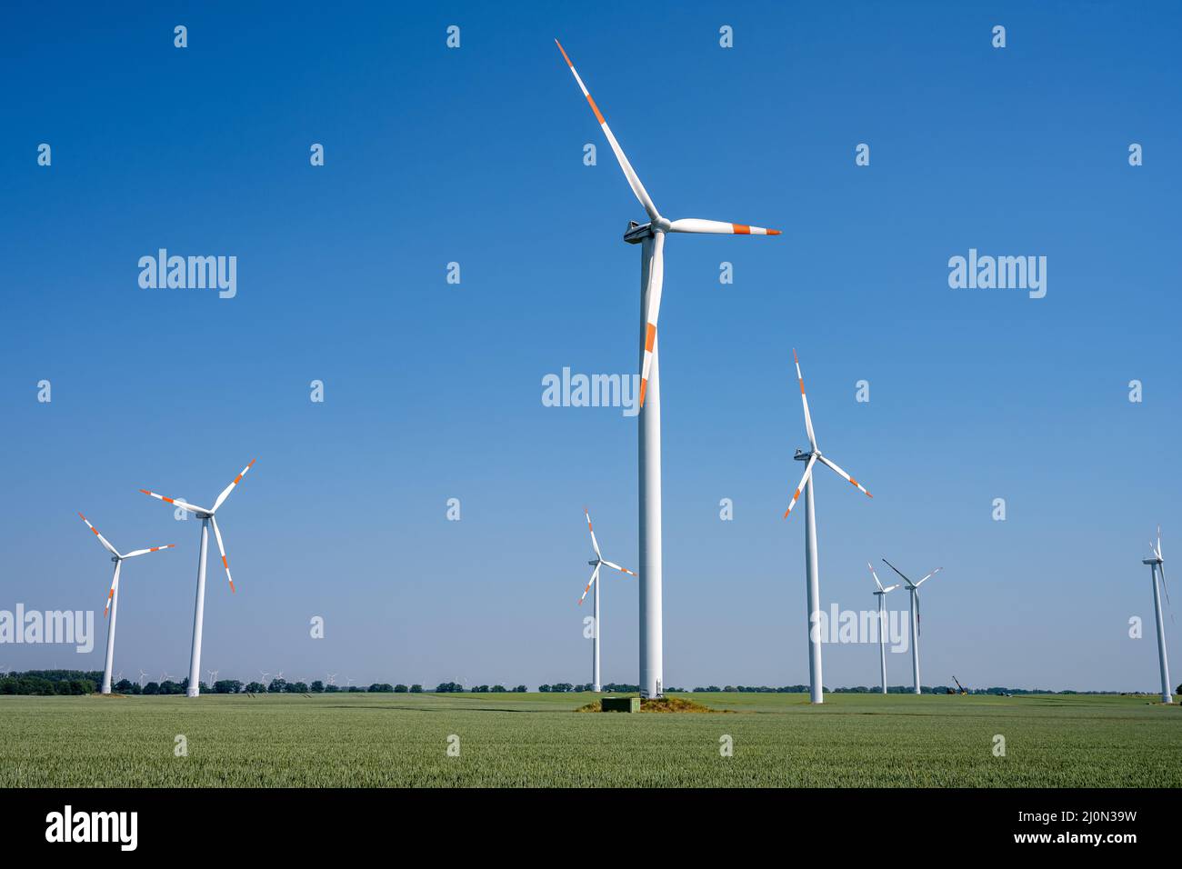 Modern wind power turbines seen in rural Germany Stock Photo