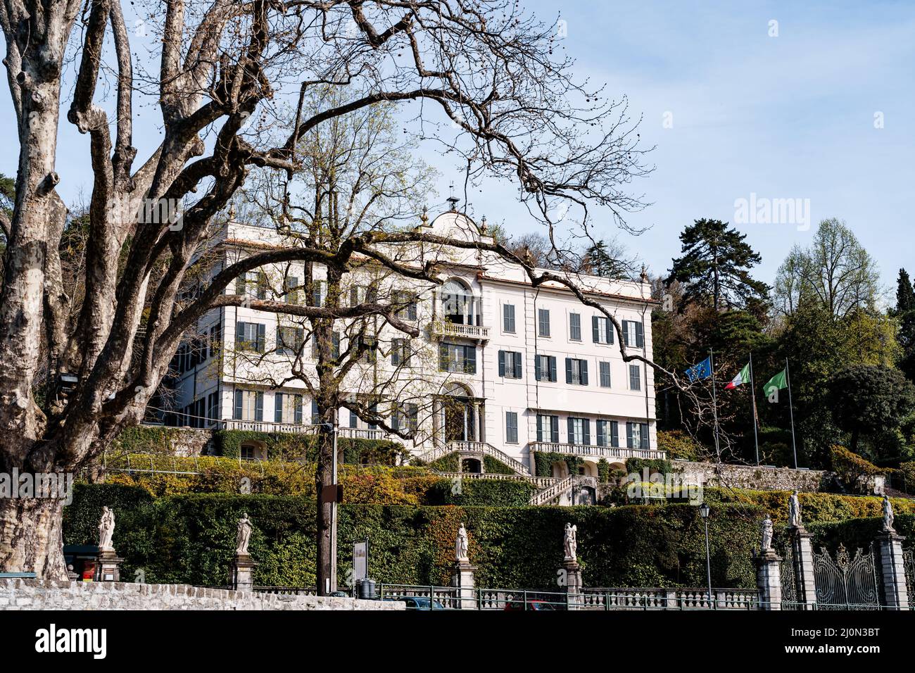 Villa Carlotta among green trees. Lake Como, Italy Stock Photo