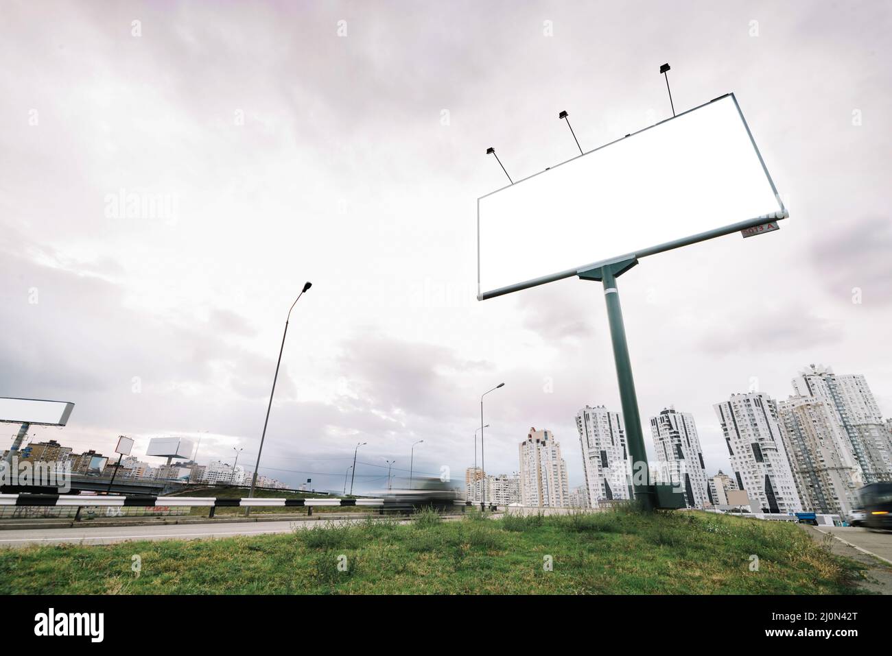 Billboard city entrance cloudy day Stock Photo