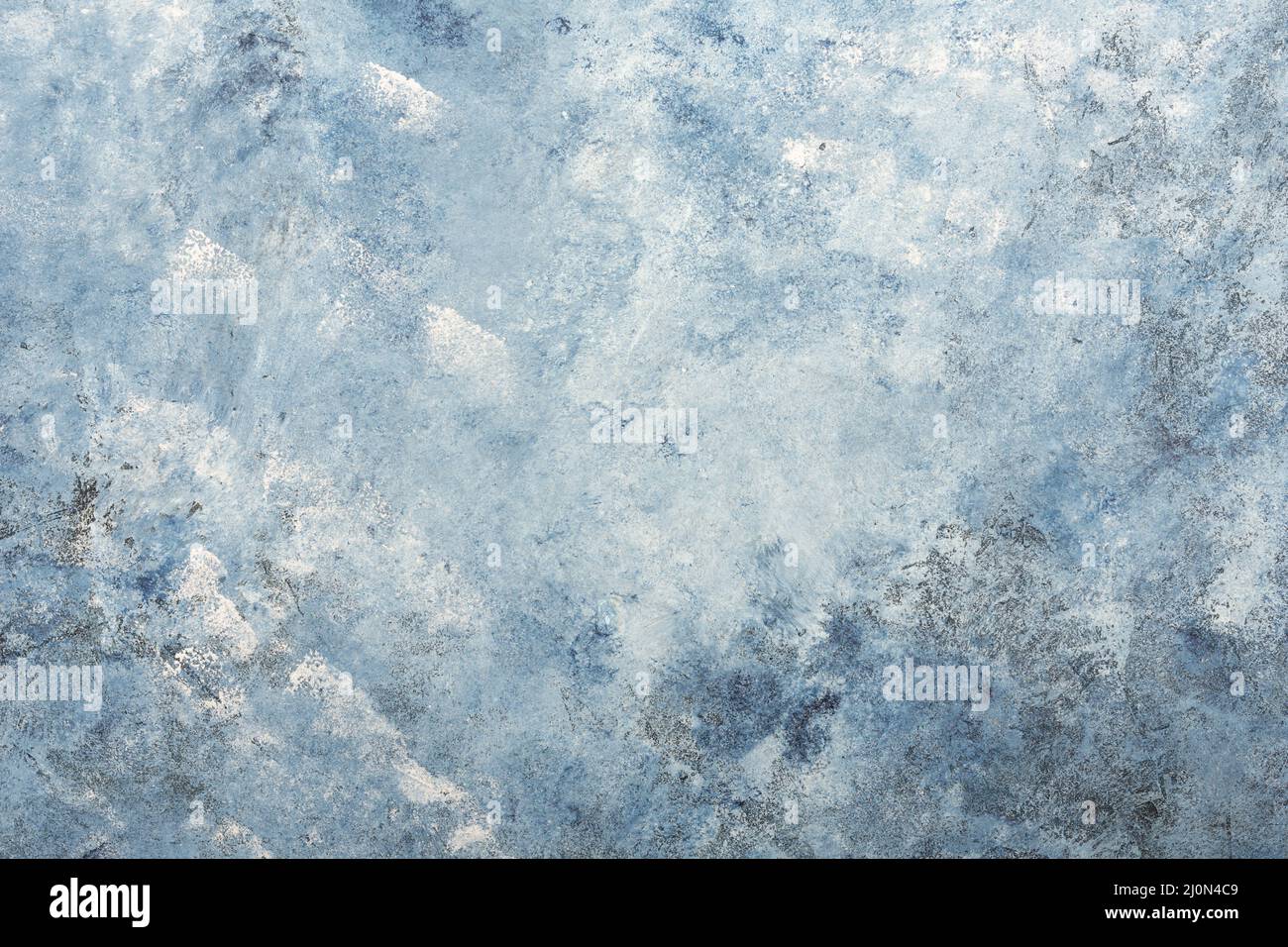 Dark blue textured stucco wall background Stock Photo