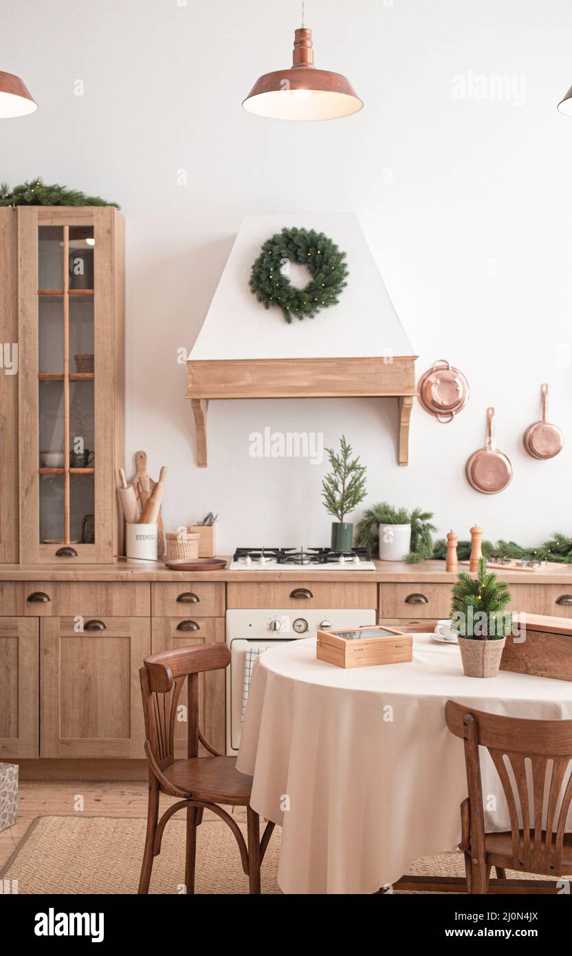 Festive christmas modern kitchen with big tree Stock Photo