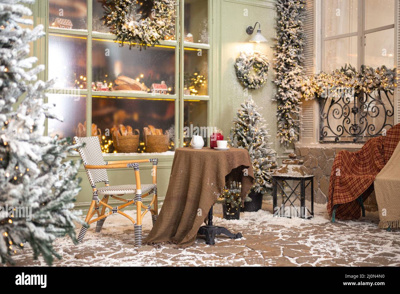 Christmas cafe bakery in snow decorations Stock Photo Alamy