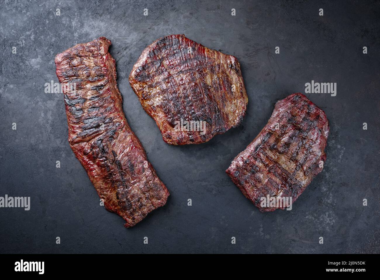 Traditional barbecue wagyu gourmet beef steaks served as top view on a