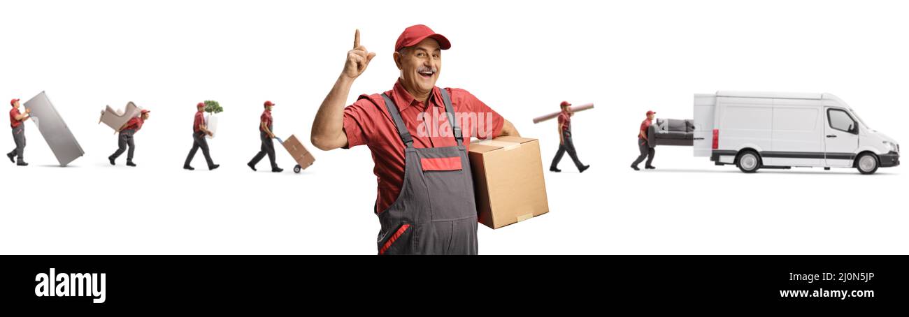 Cheerful mature mover pointing up and other movers putting household items in a van isolated on white background Stock Photo