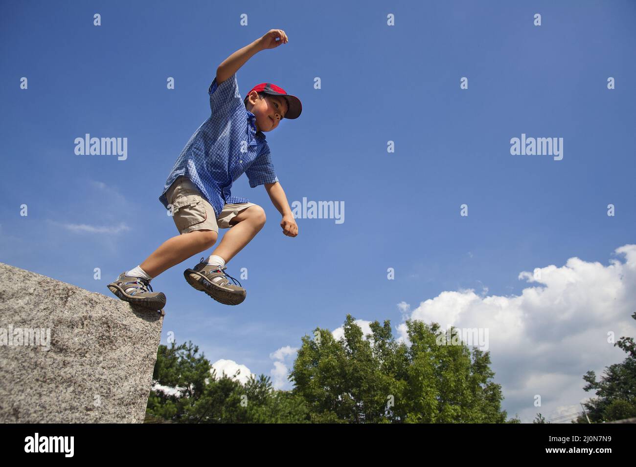 Leap Over Rocks Rock boy hi-res stock photography and images - Alamy