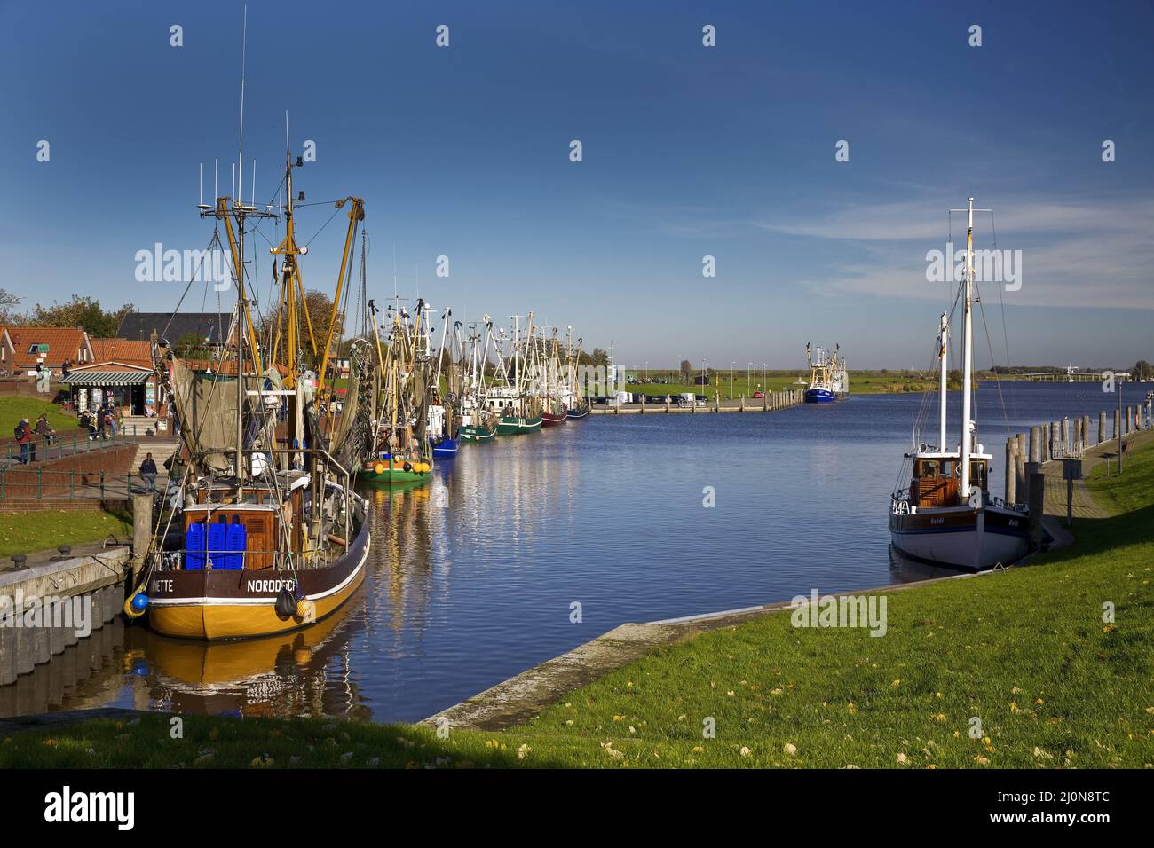 Fishing port with shrimp cutters, Greetsiel, East Frisia, Lower Saxony, Germany, Europe Stock Photo