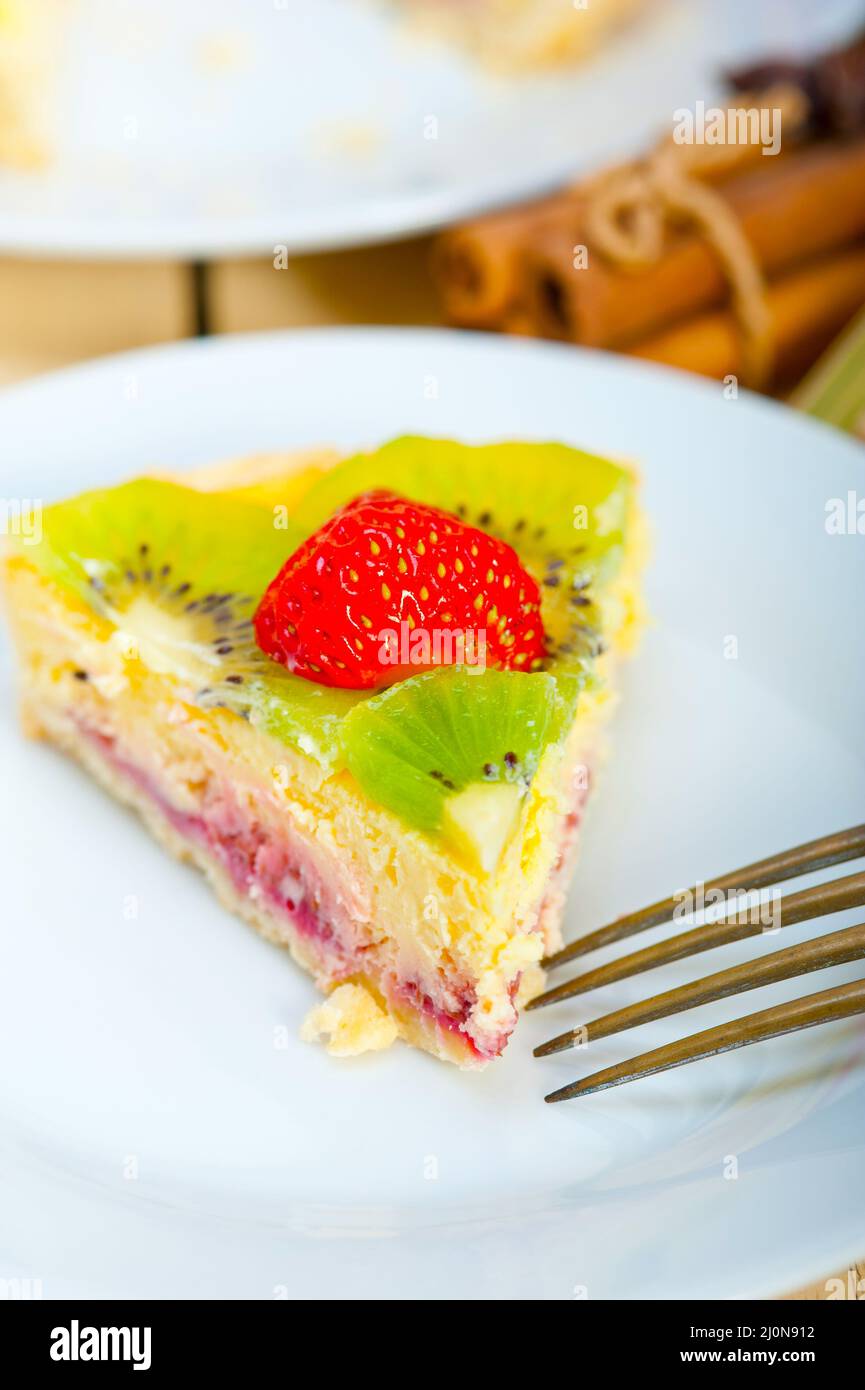 kiwi and strawberry pie tart with lemon custard cream and spices Stock